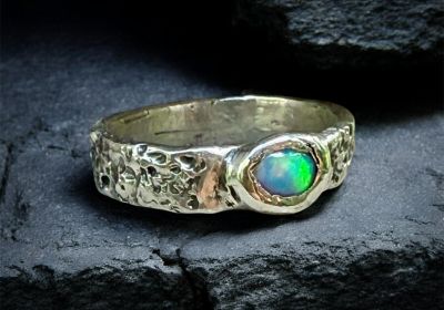 Silver ring with opal