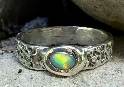 Silver ring with opal