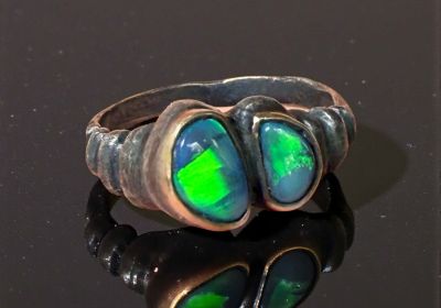 ring with 2 small opals